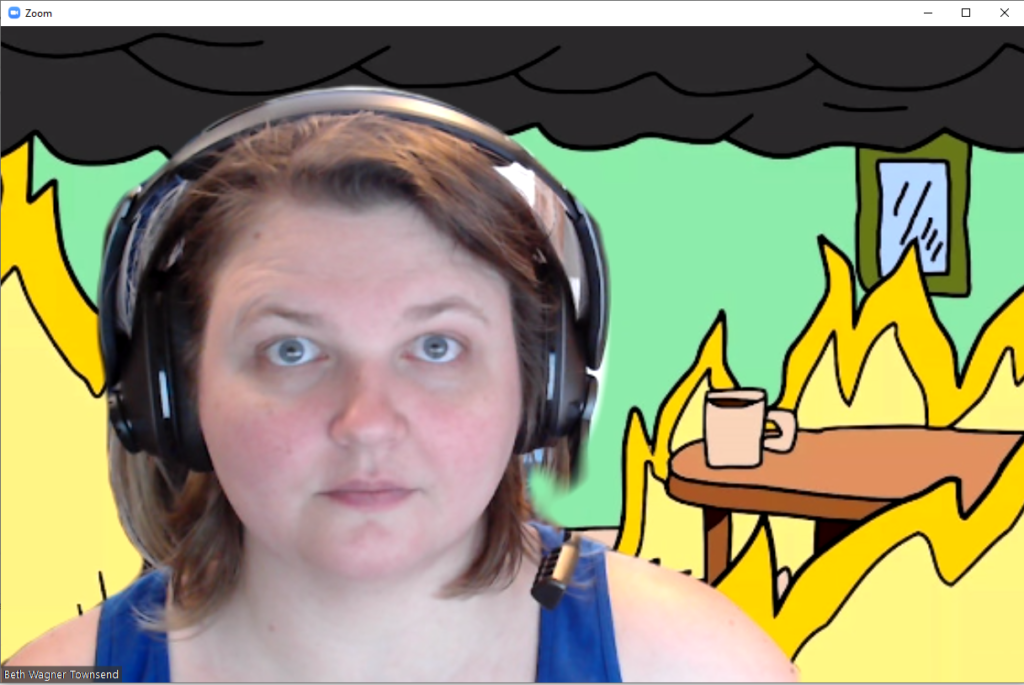 photo of beth in front of flaming cartoon background