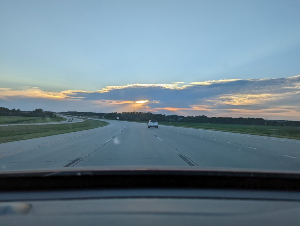 photo of sunset from car along I80 in Iowa