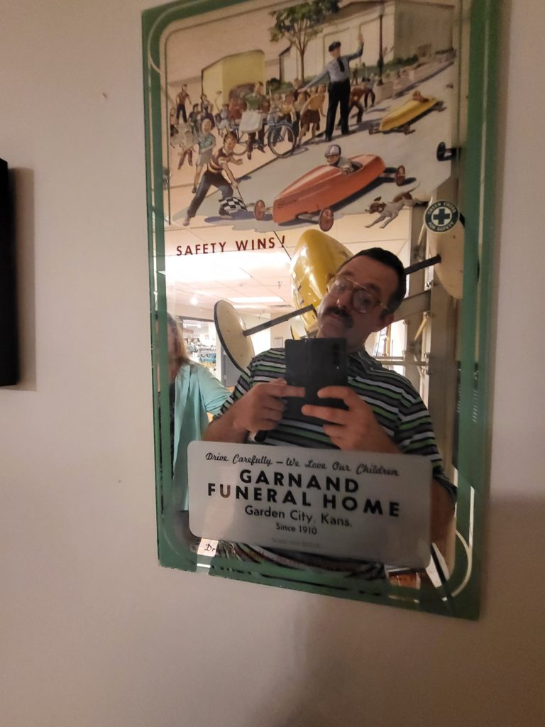 photo of Zach in a mirror that says Safety Wins