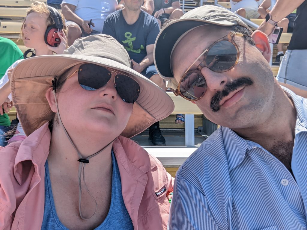 photo of Zach and Beth in the grandstands at IndyCar race