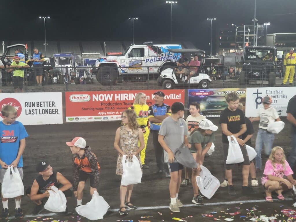 photo of children on track at Knoxville Raceway for the candy dash event