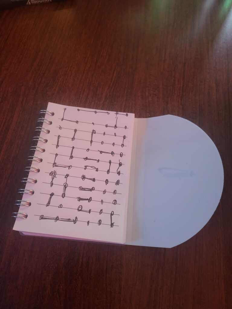 photo of notebook paper dots game